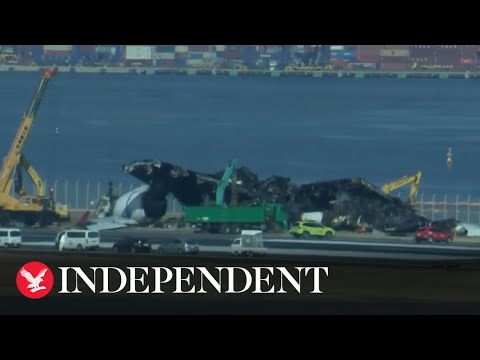 Watch again: Japan aircraft wreckage to be removed following airport collision