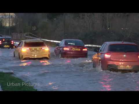 Drivers tackle flood water in Gloucestershire as Tewkesbury nearly cut off