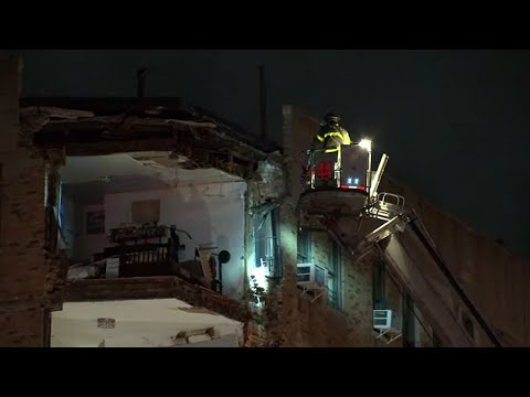 Firefighters search for anyone trapped after corner of six-story NY apartment building collapses