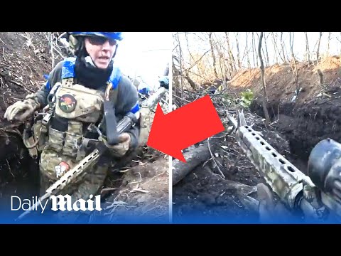 Female Ukraine combat medic fires back as four Russian tanks attack her trench and wound comrades