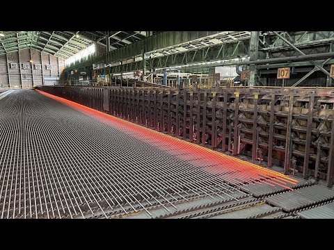 Process of mass production of rebar. A wonderful Japanese steel factory.