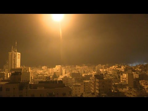 Flares light up sky over northern Gaza | AFP