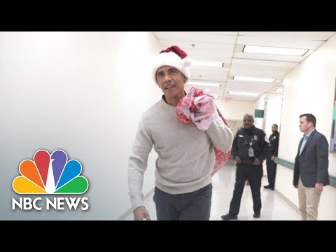 Barack Obama Delivers Holiday Gifts Wearing Santa Hat At Children&rsquo;s Hospital | NBC News