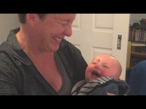 Baby Laughs at Mom Putting Pacifier in Mouth