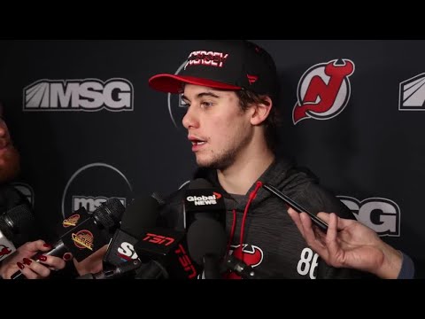 Hughes brothers and Devils look ahead to historic game in Vancouver