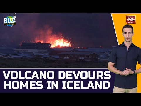 Watch Volcanic Lava Flow Into Icelandic Town &amp; Set Houses On Fire Breaching Built Defences | BUZZ