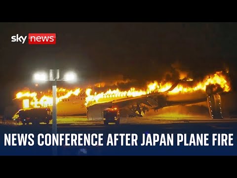 Japanese authorities hold news conference after plane fire at airport in Tokyo