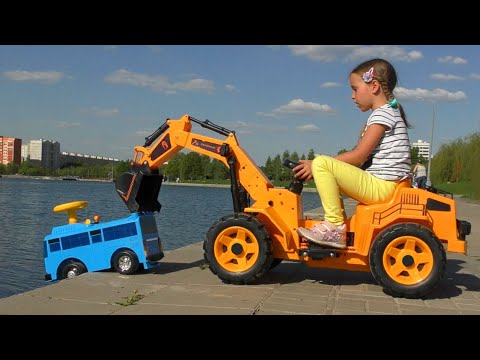 Sofia helps toy Minibus and plays on Сhildren's park