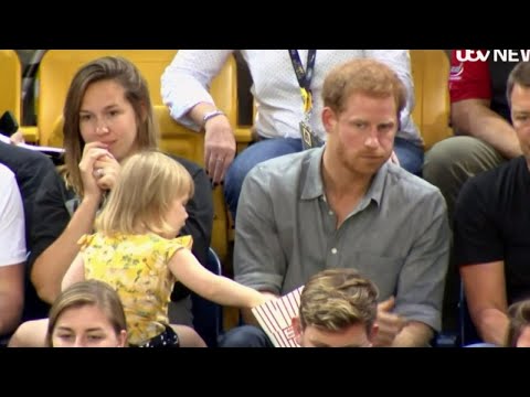 Watch This 2-Year-Old Girl Adorably Steal Popcorn From Prince Harry