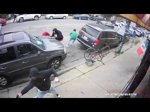 Chicago shootout that injured innocent bystander caught on video