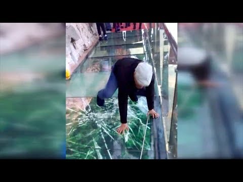 Tourist terrified by new glass walkway that cracks under weight