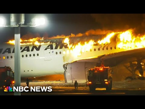 Video shows Japan Airlines passenger plane in flames at Tokyo airport