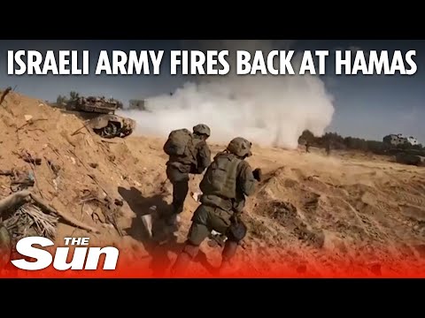 Israeli troops fire at Hamas-occupied buildings in explosive ground assault