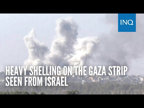 Heavy shelling on the Gaza Strip seen from Israel