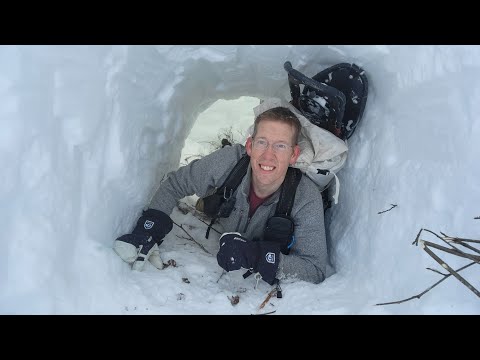 Camping Under the Snow in Survival Shelter