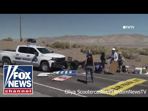 Police plow through climate protest, arrest activists blocking traffic