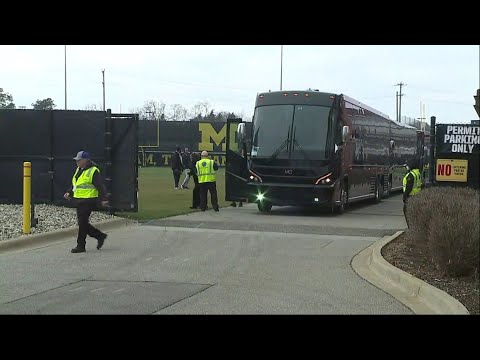 Wolverines headed to airport en route to Houston for championship game