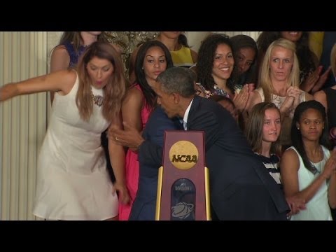 Obama helps UConn player who fell off stage