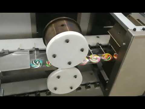 Automatic flat lollipop wrapping machine