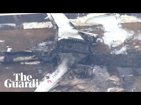 Aerials show plane wreckage after crash at Japan's Haneda airport