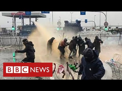 Water canon and tear gas used on migrants at Belarus-Poland border - BBC News