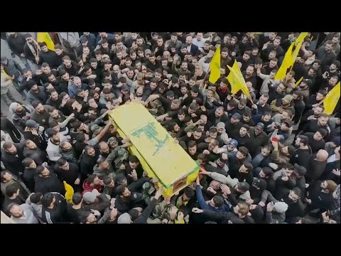 Hundreds mourn Hezbollah fighter killed in clashes with Israeli troops in southern Lebanon