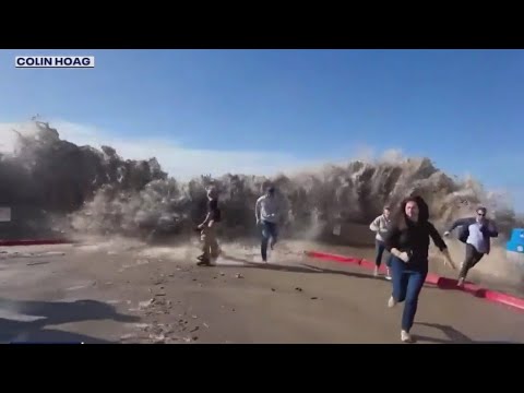 California rogue wave knocks people down, leaving other beachgoers running for safety