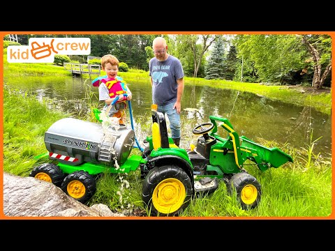 Watering crops and fertilizing with kids tractor on the farm. Educational how pumps work | Kid Crew