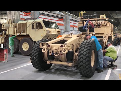 Inside Factory Building US Army Massive Armored Trucks