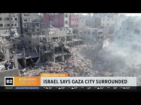 Israel says Gaza city surrounded