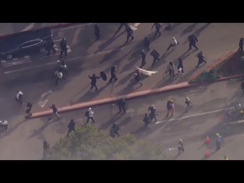 Pro-Palestine protesters clash with LAPD at LAX