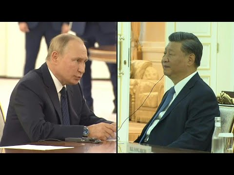 Le pr&eacute;sident russe Vladimir Poutine rencontre son homologue chinois Xi Jinping | AFP Images