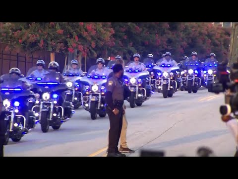 Trump's motorcade makes its way through Atlanta for his surrender for GA elections charges