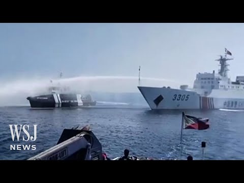 Chinese Coast Guard Blasts Philippine Boats With Water Cannons | WSJ News