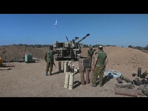 Israeli soldiers fire artillery into Gaza, one month after 7th October Hamas Attack on Israel