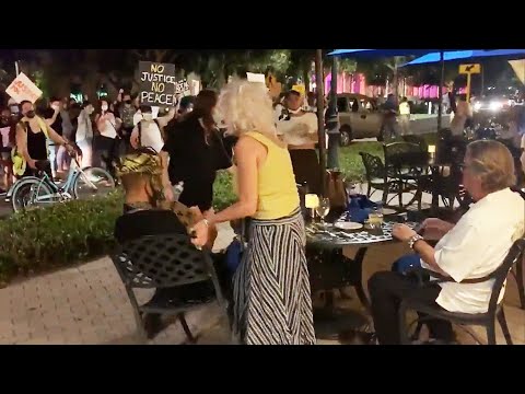 Couple Dining Outside Is Confronted by Protesters