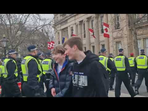 Tsg police Marching through trafalgar Square 