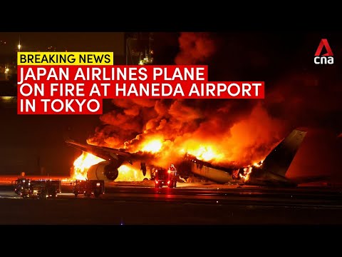 Japan Airlines plane catches fire at Tokyo's Haneda airport