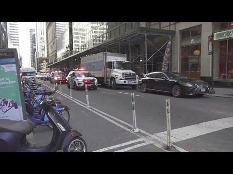 Motorcade arrives at Trump Tower