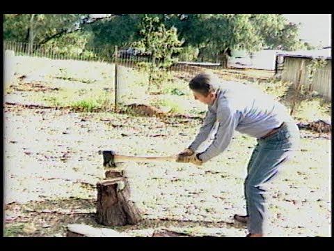 President Reagan chopping wood with axe at Rancho Del Cielo on November 27, 1982