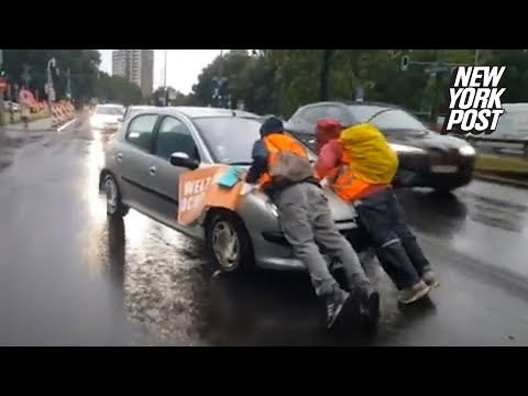 Irate drivers ram into climate protesters blocking traffic, drag them hundreds of feet down highway