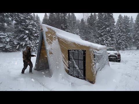 COZY TENT CAMP WITH STOVE IN A BLIZZARD