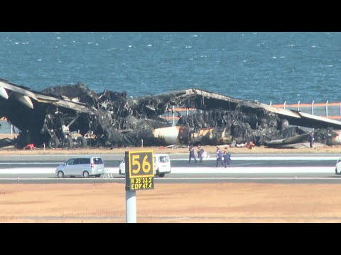 Pilotos da Japan Airlines n&atilde;o viram avi&atilde;o da Guarda Costeira | AFP