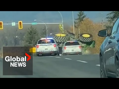 Tractor flips during police chase on BC highway