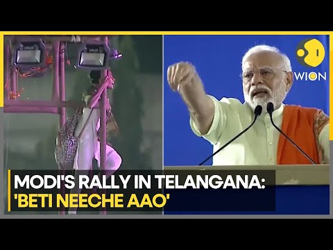 Drama at PM Modi's election rally in Telangana as woman climbs tower to protest | WION