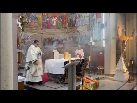 Christian Palestinians attend Christmas Eve mass at church in Gaza City where they sought shelter