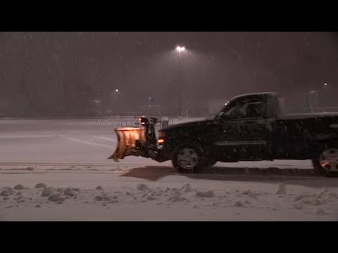 Snow piles up on roads in Orange County