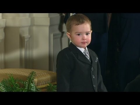 Little boy steals show at medal ceremony