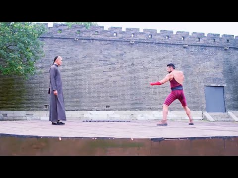 Russian Hercules laughed at Chinese Kungfu for being weak but was kicked away by a Chinese master