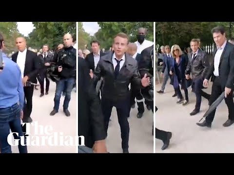 'Be cool': Emmanuel Macron accosted by protesters during walk in Paris park